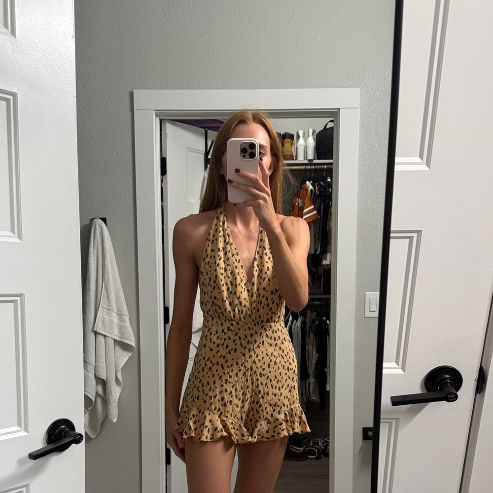 Francesca's Collections Yellow and Black Polka Dot Romper